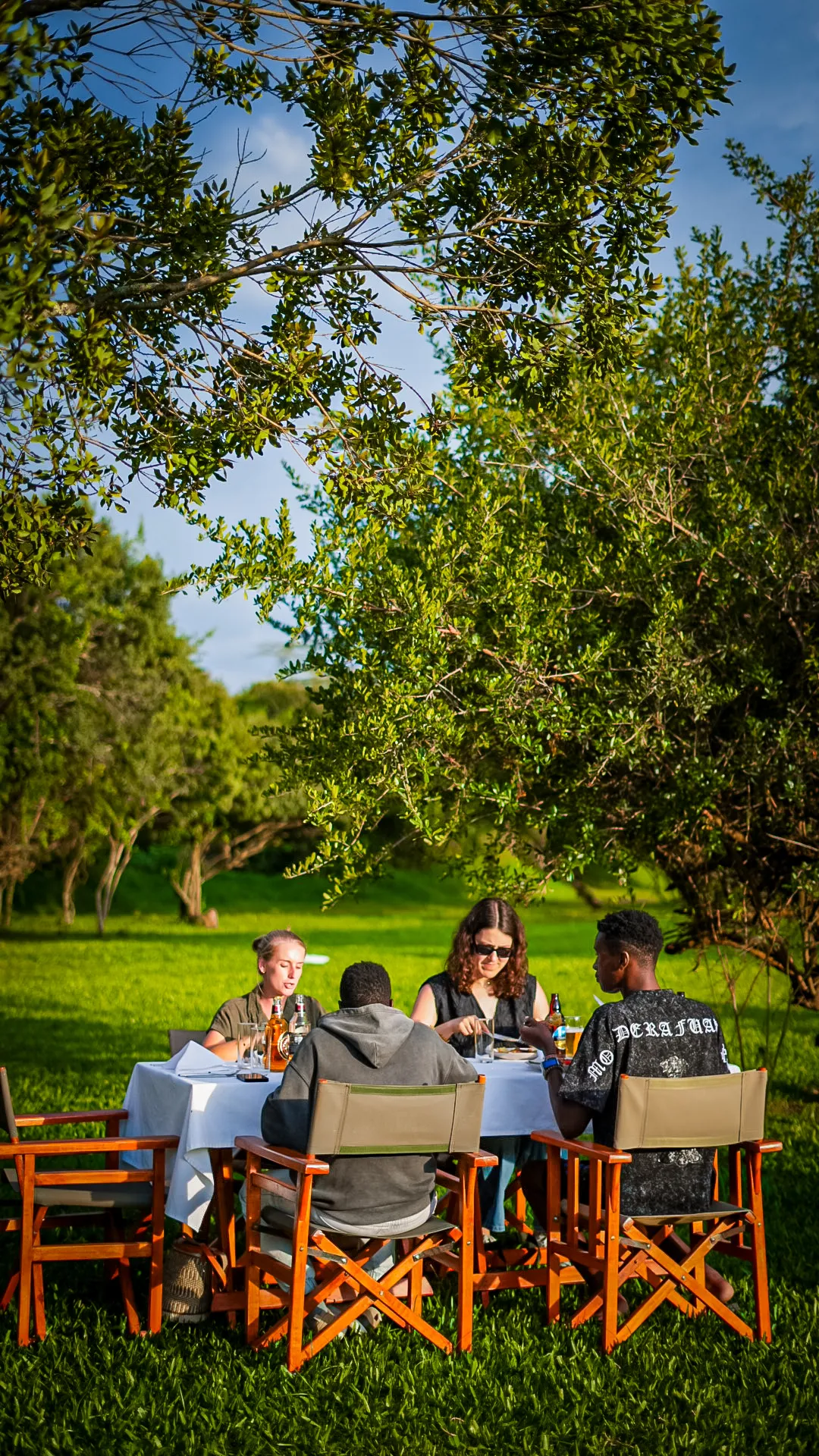 Mwituni Bush Restaurant — open-air dining under the stars with wildlife passing nearby