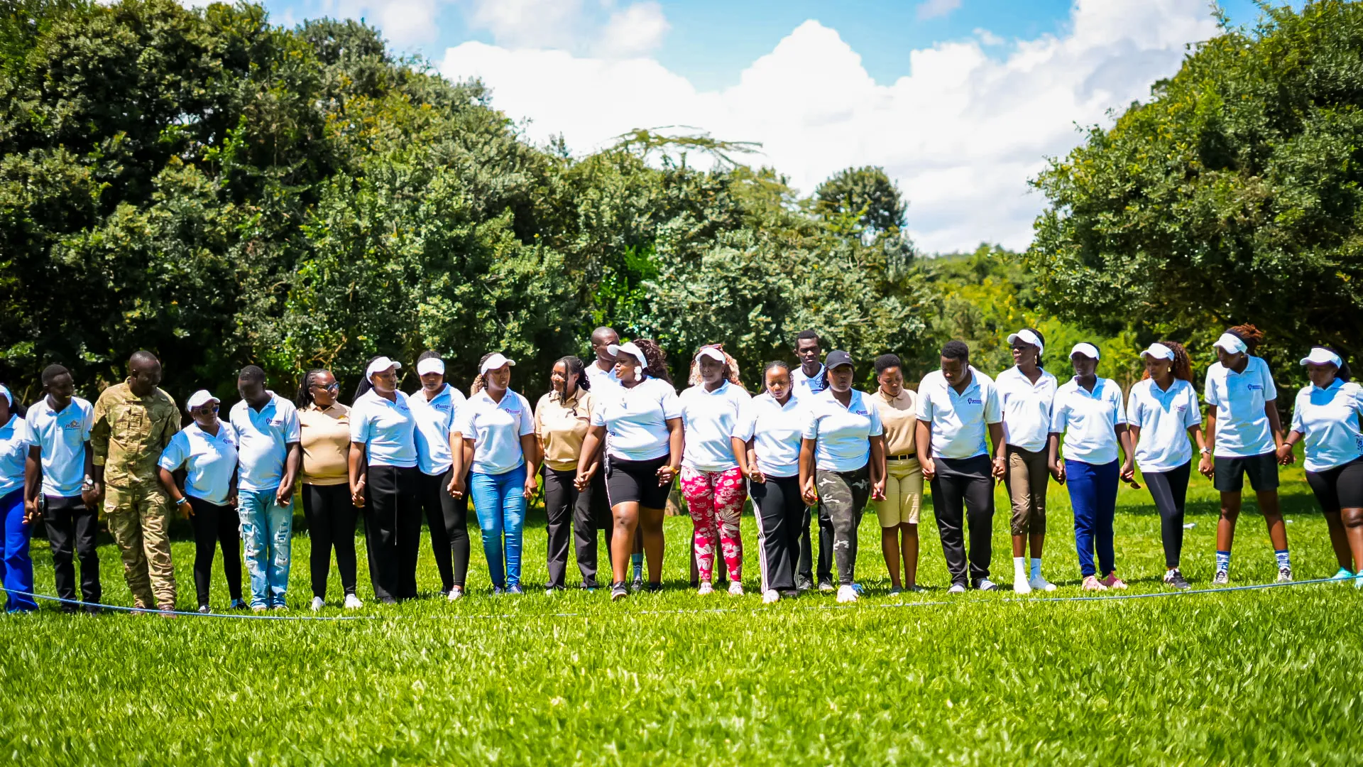 A corporate group gathered for a team-building retreat at Mtalii