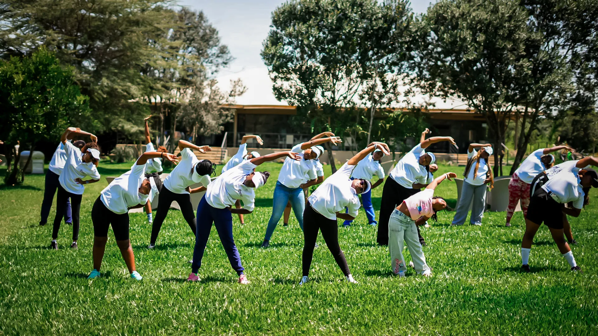 A high-energy team-building activity on the open lawn at Mtalii
